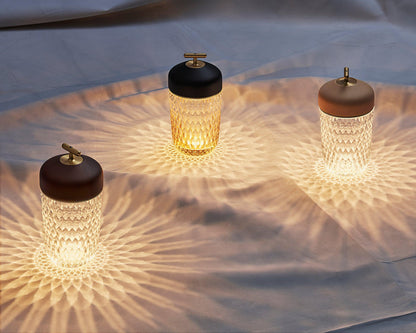 Rechargeable crystal glass lamps with brown tops and gold-tone handles