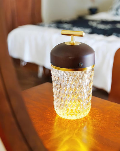 Faceted crystal glass table lamp with brown top and gold-tone carry handle 42