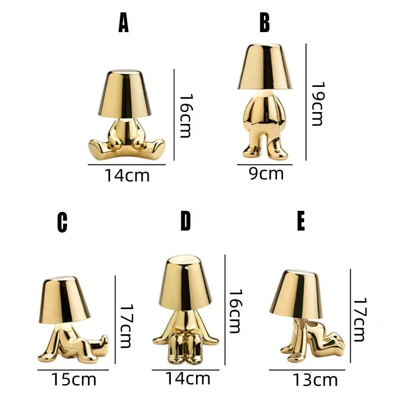 Five gold rechargeable LED figure table lamps in different poses, labelled A to E with their respective height and width dimensions in centimetres.