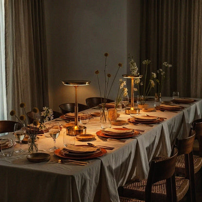 Dimmable LED table lamps illuminating a dining setting