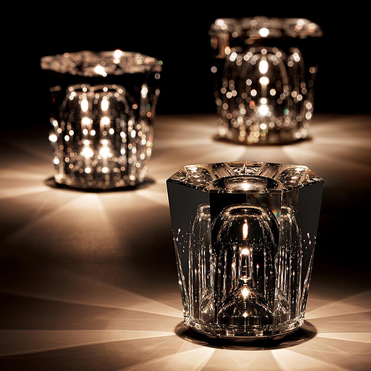 Three faceted crystal glass table lamp models with warm LED illumination