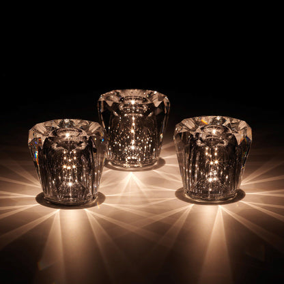 Three faceted crystal glass table lamp models with warm LED illumination