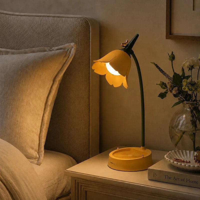 Yellow flower lamp on a bedside table