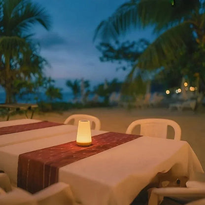 Rechargeable night light on an outdoor dining table