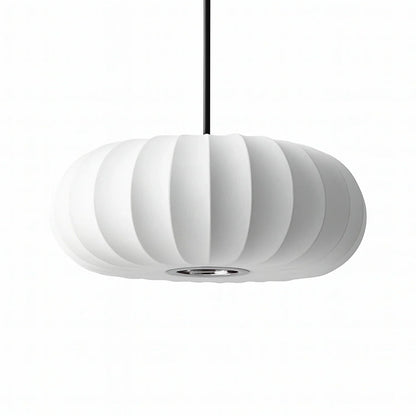 A retro silk pumpkin pendant light in white, featuring a ribbed design and hanging from a black cord against a plain white background.
