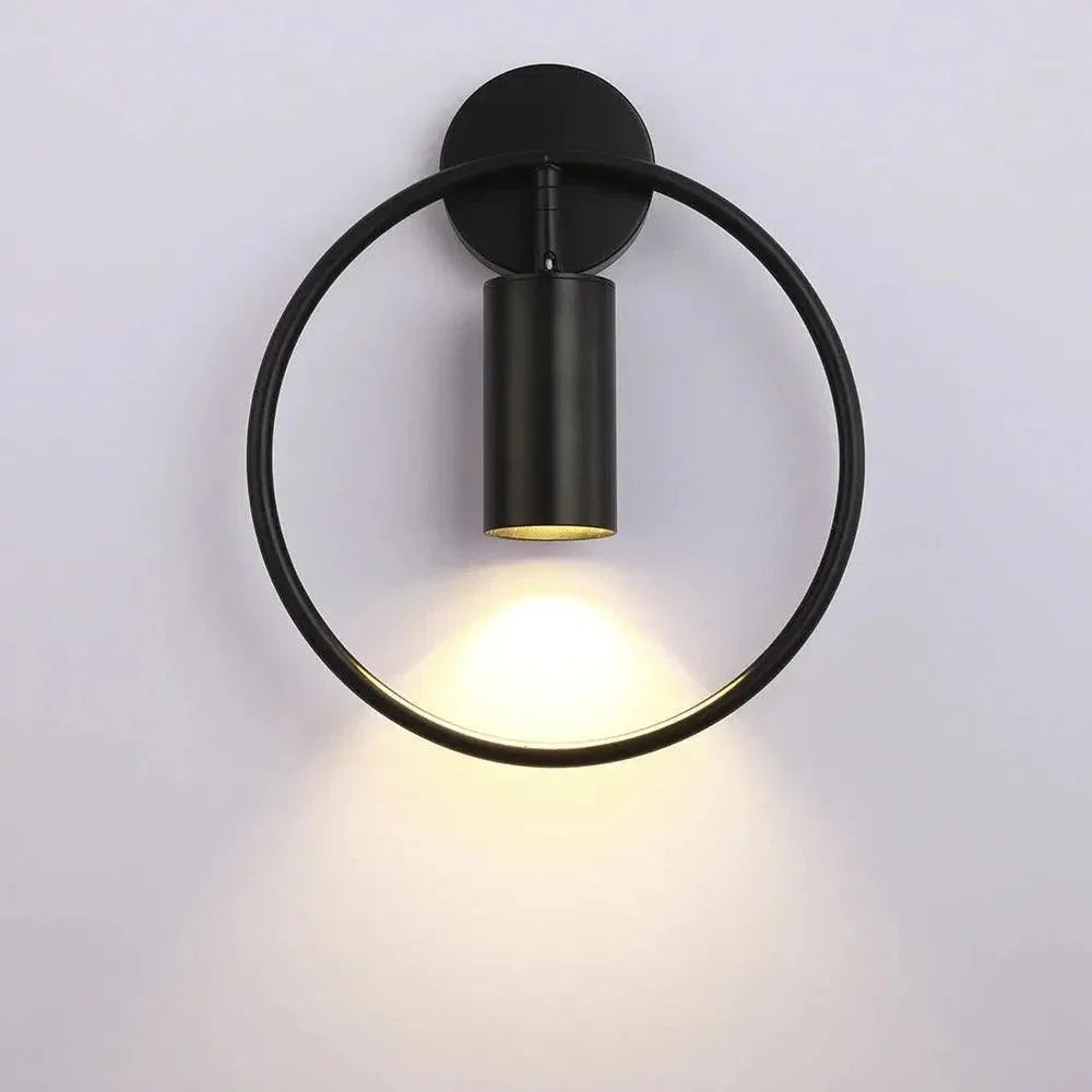 Black ring wall light with adjustable spotlight