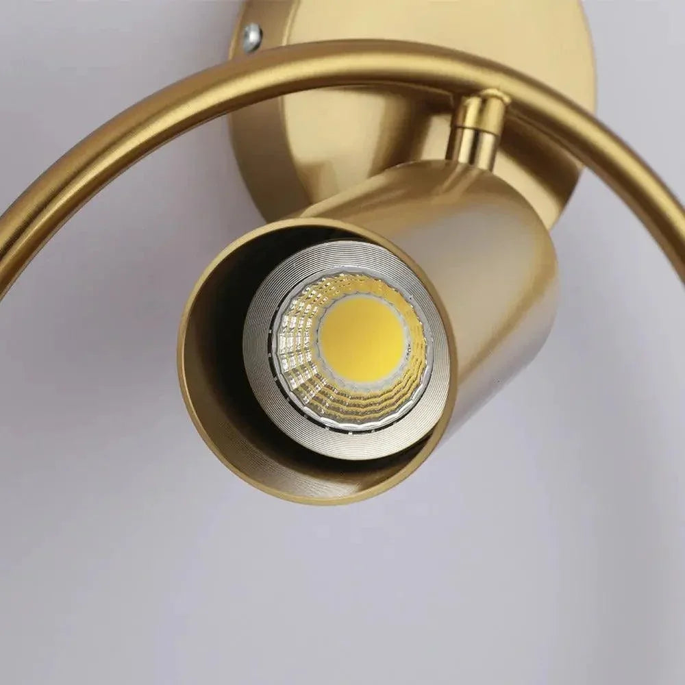 Close-up of adjustable spotlight within gold ring