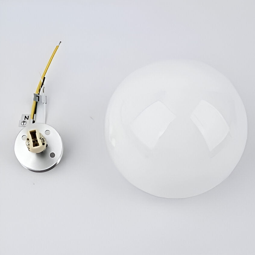 Round glass wall sconce with modern minimalist design