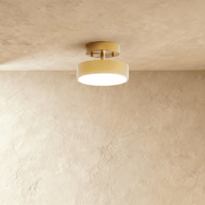 Small copper-coloured iron semi-flush ceiling light illuminated