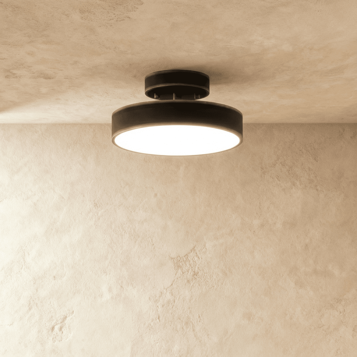 Medium black round iron ceiling light illuminated