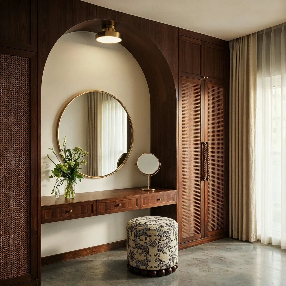 Copper-coloured iron ceiling light above a dressing table