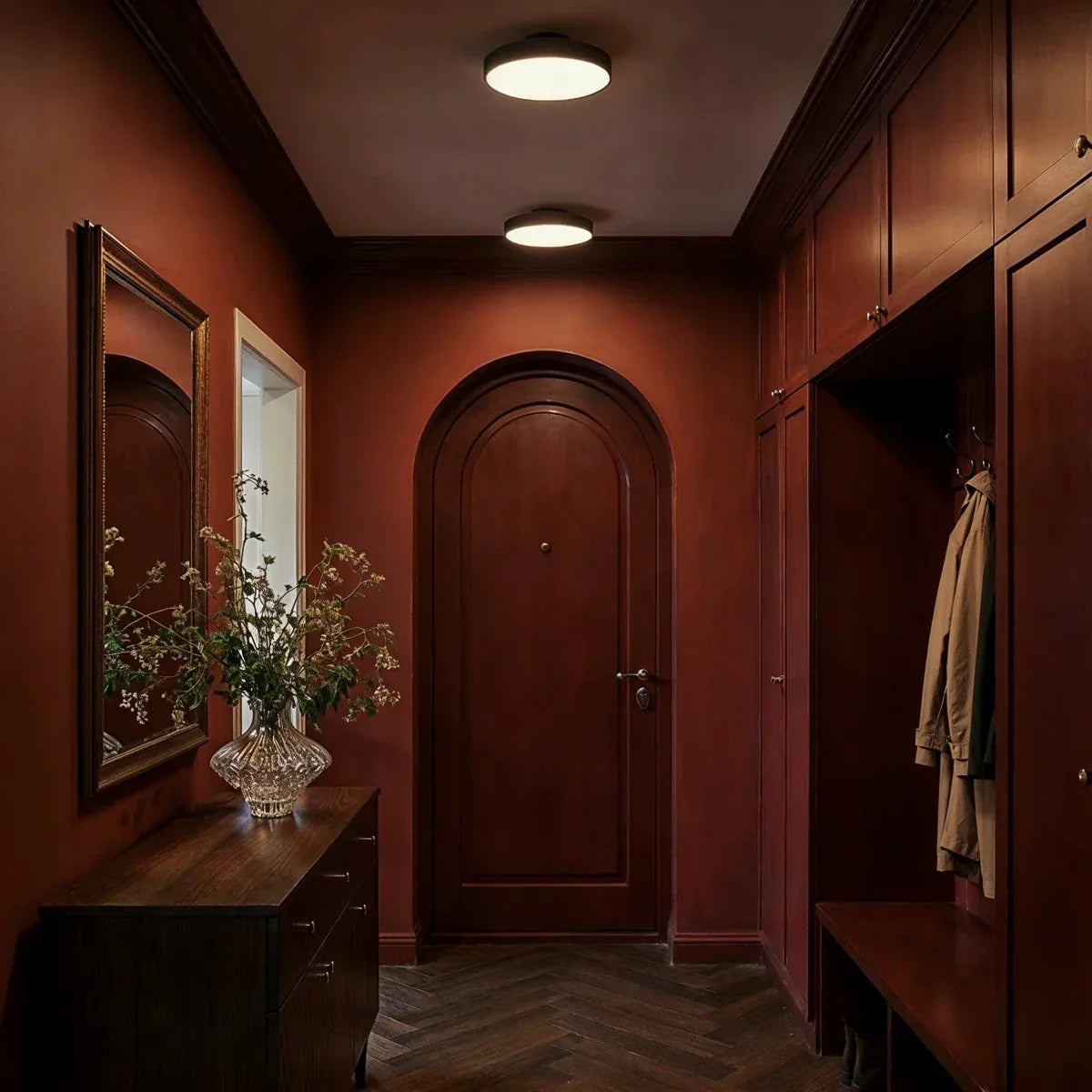 Round iron ceiling lights in a hallway