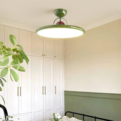 Green LED ceiling light in a bedroom