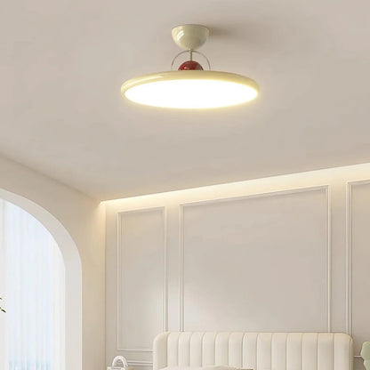 Beige round ceiling light in a living area