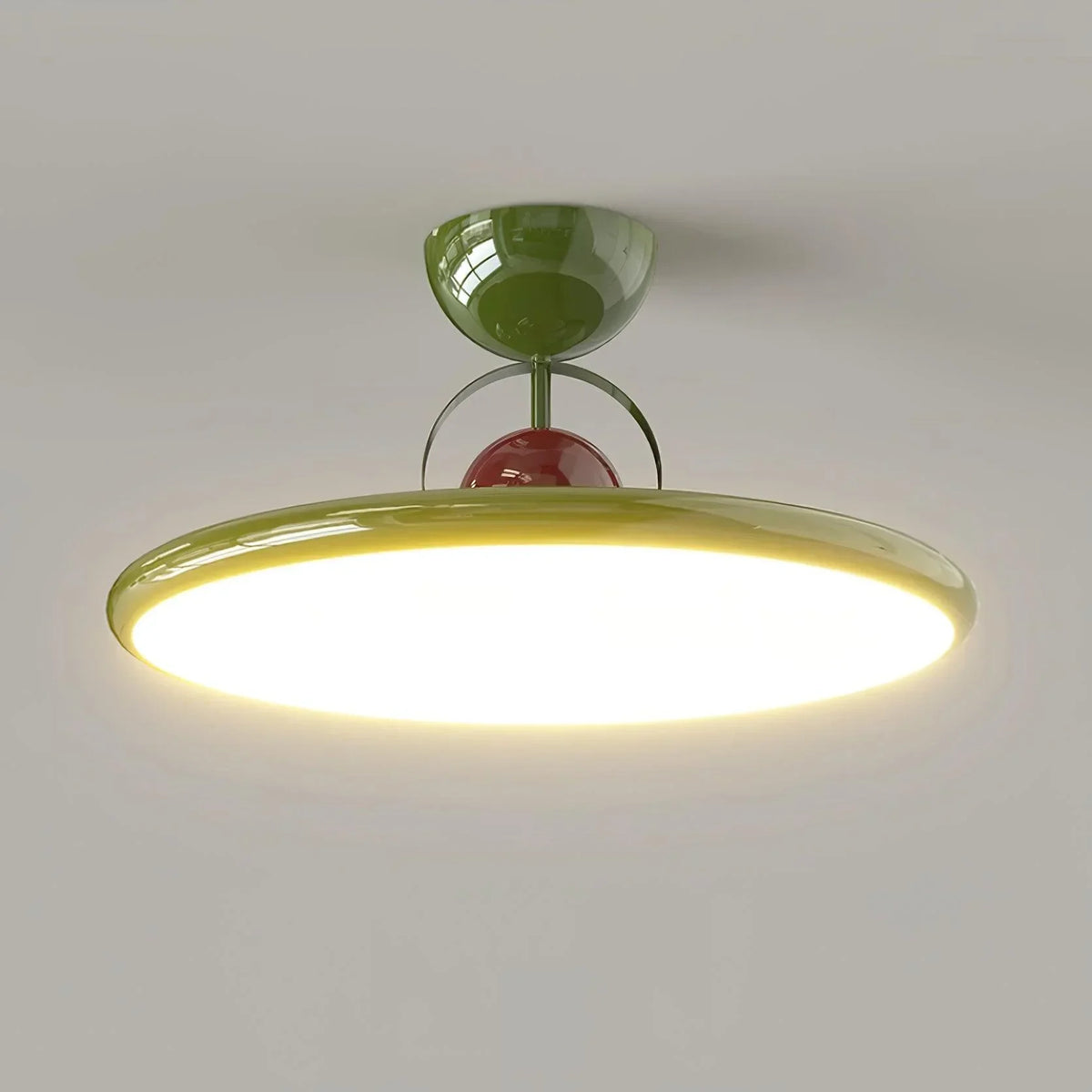Green disc-shade LED ceiling light viewed from below
