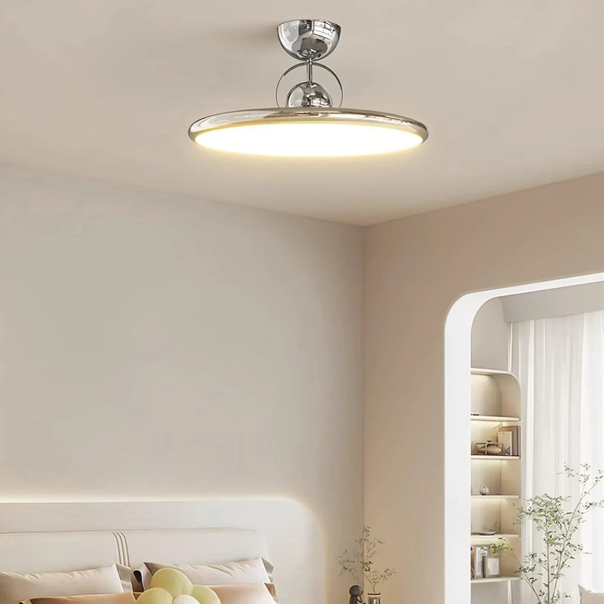 Chrome LED semi-flush ceiling light in a living room