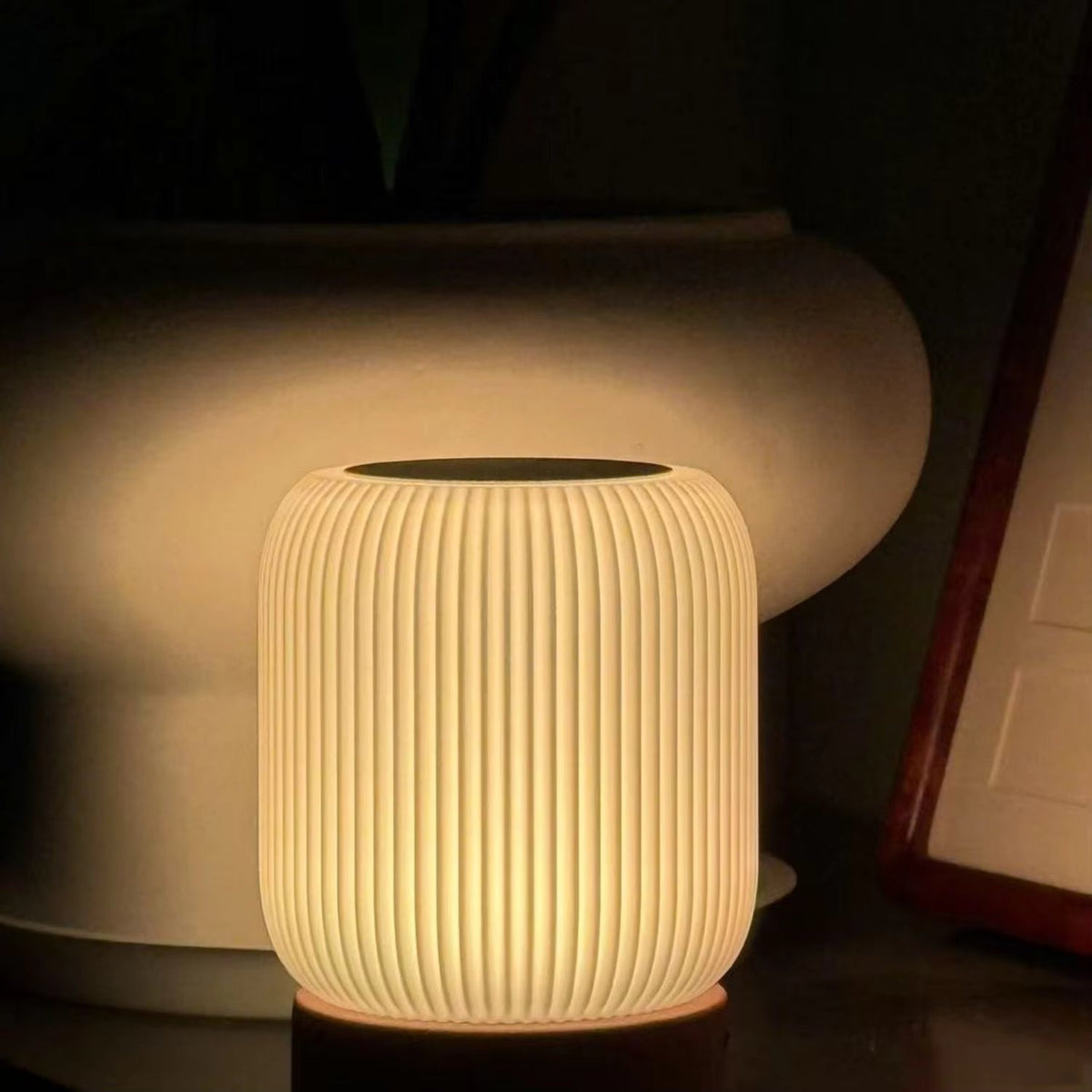 Close-up of illuminated ribbed plastic night light shade