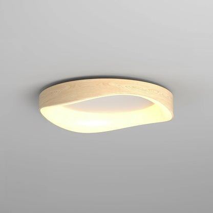 Light wood-effect flush mount ceiling light viewed from below