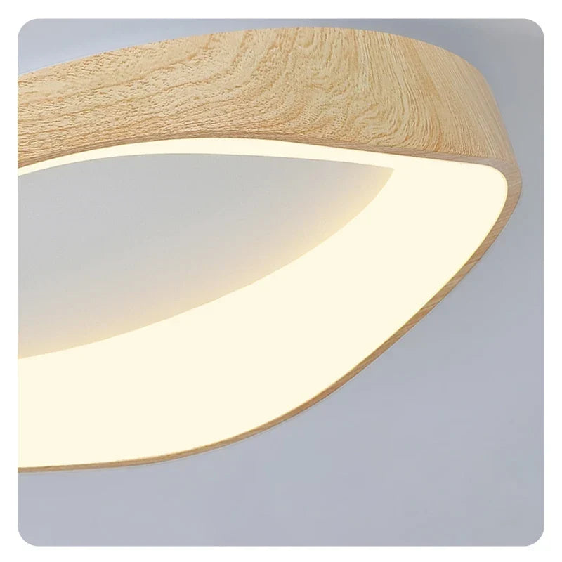Close-up of a light wood-effect LED ceiling light frame