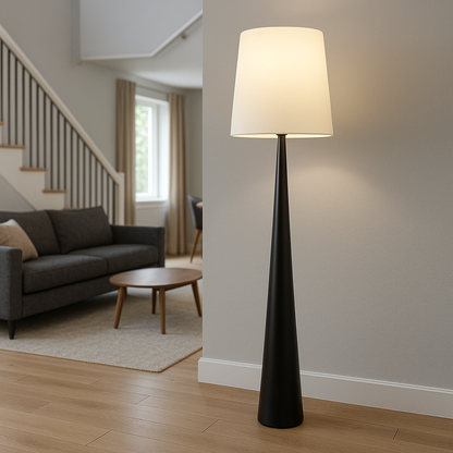 Scandinavian floor lamp with tapered base in a living room