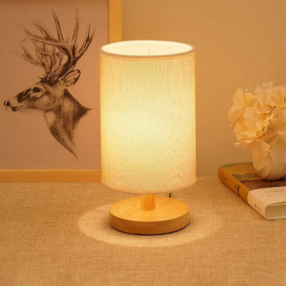 Wood and linen table lamp with warm light