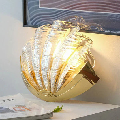 Glowing seashell wall sconce close-up
