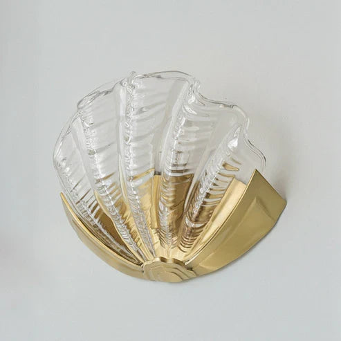 Clear glass seashell wall sconce