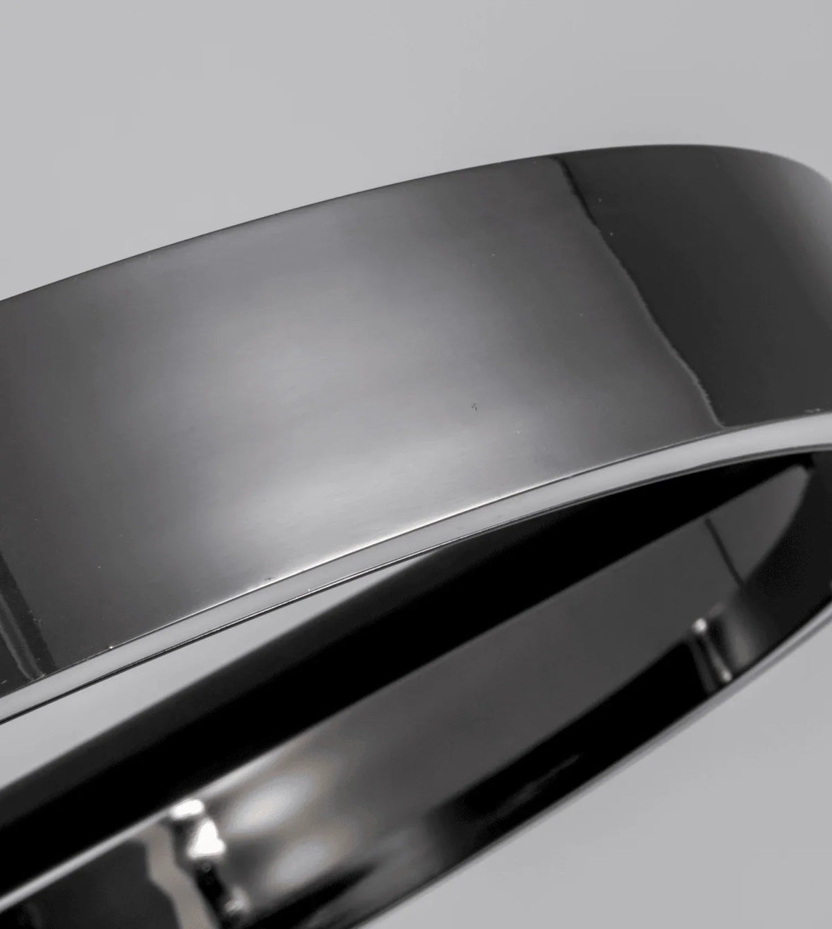 Close-up of polished chrome ring shade