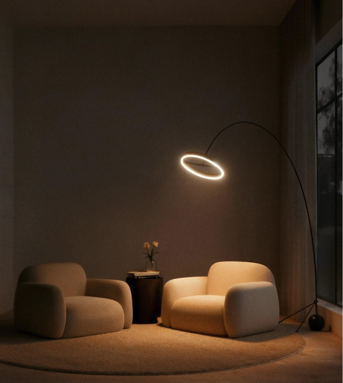 Arc floor lamp lighting two armchairs