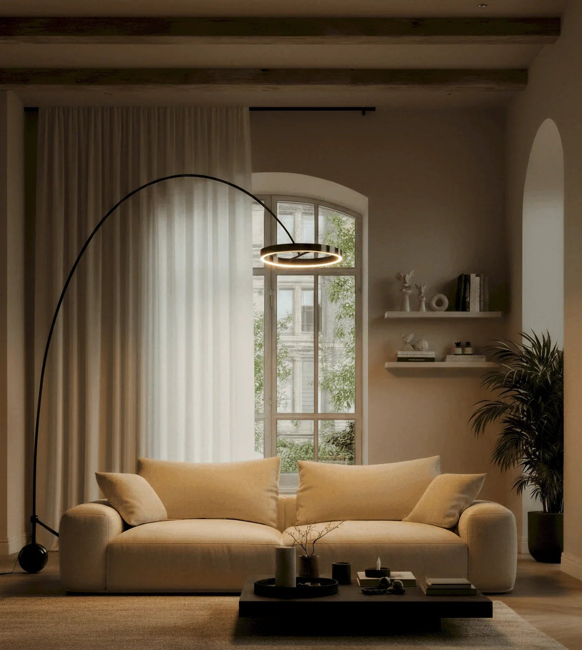 Dimmable arc floor lamp illuminating a sofa