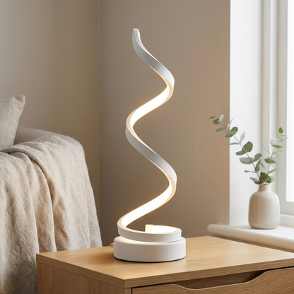 White spiral LED table lamp with illuminated curved design