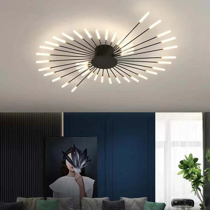 Large black sunburst LED ceiling light above a bedroom