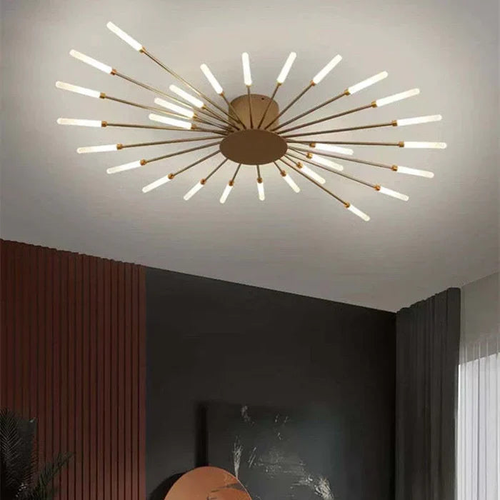 Gold sunburst ceiling light viewed from below