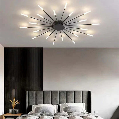 Compact black sunburst ceiling light above a bedroom
