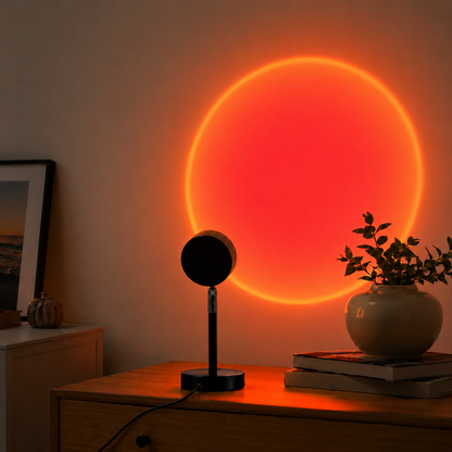 Red sunset projector light on a bedroom wall