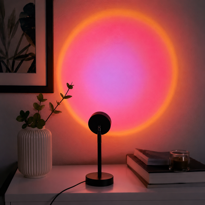 Pink sunset projection above a table