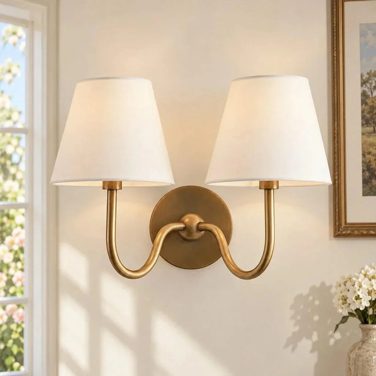 Brass double-arm wall light with plain shades