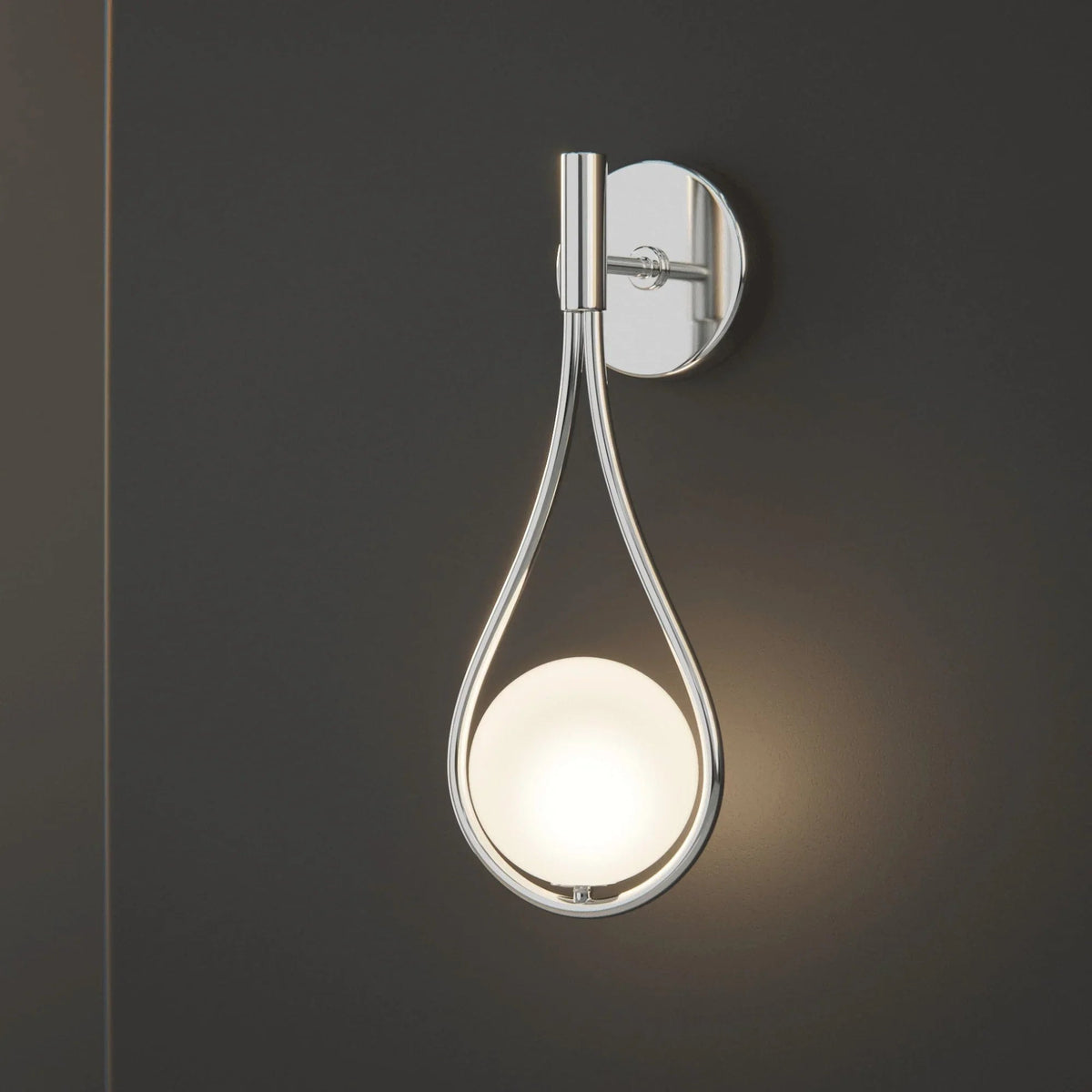 Silver teardrop globe wall light close-up