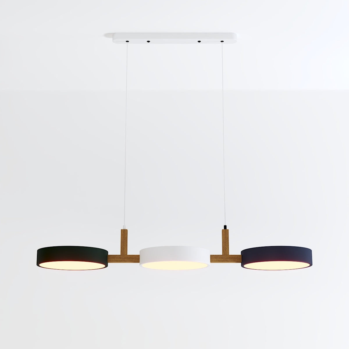Black and white disc pendant with warm light