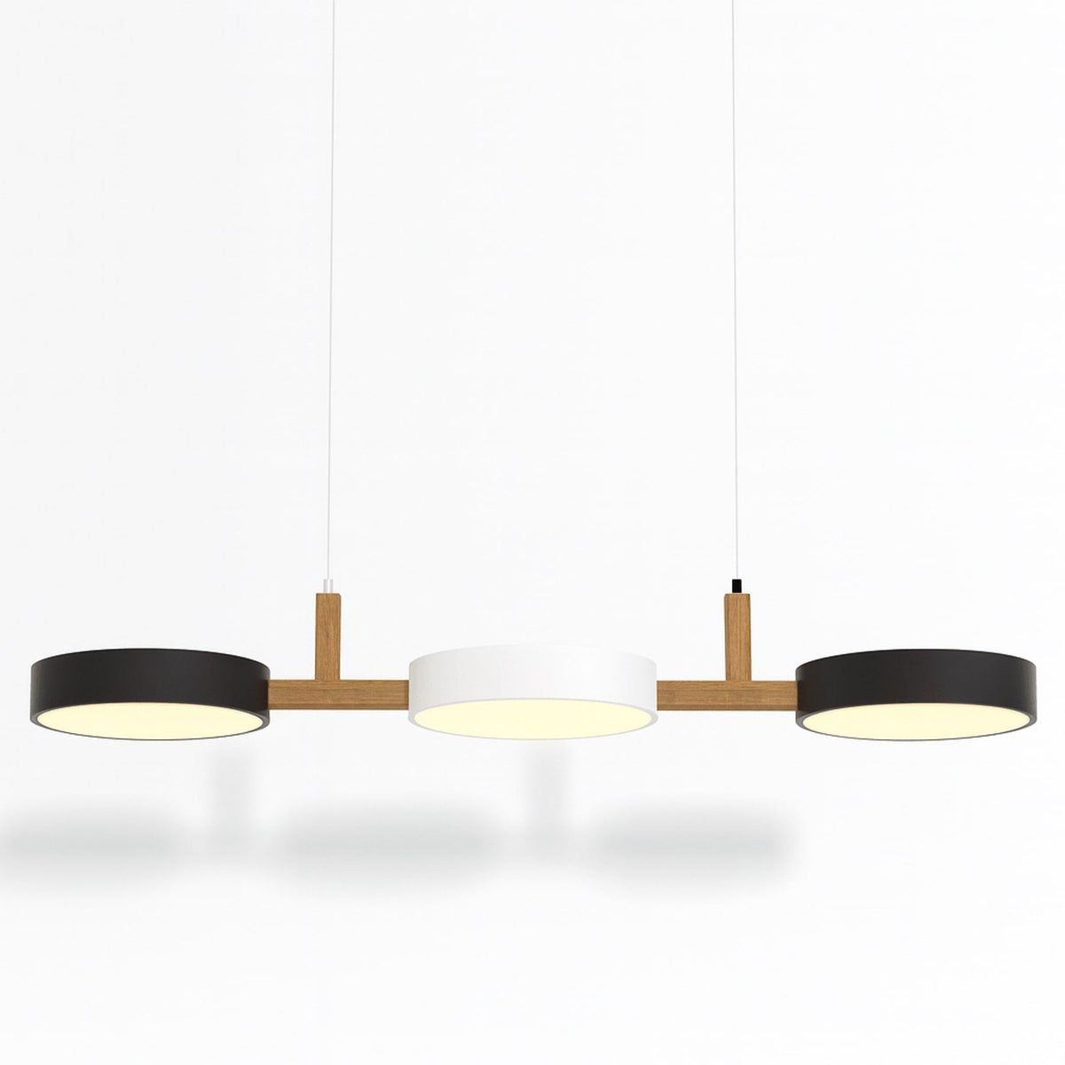 Black and white linear pendant with warm illumination