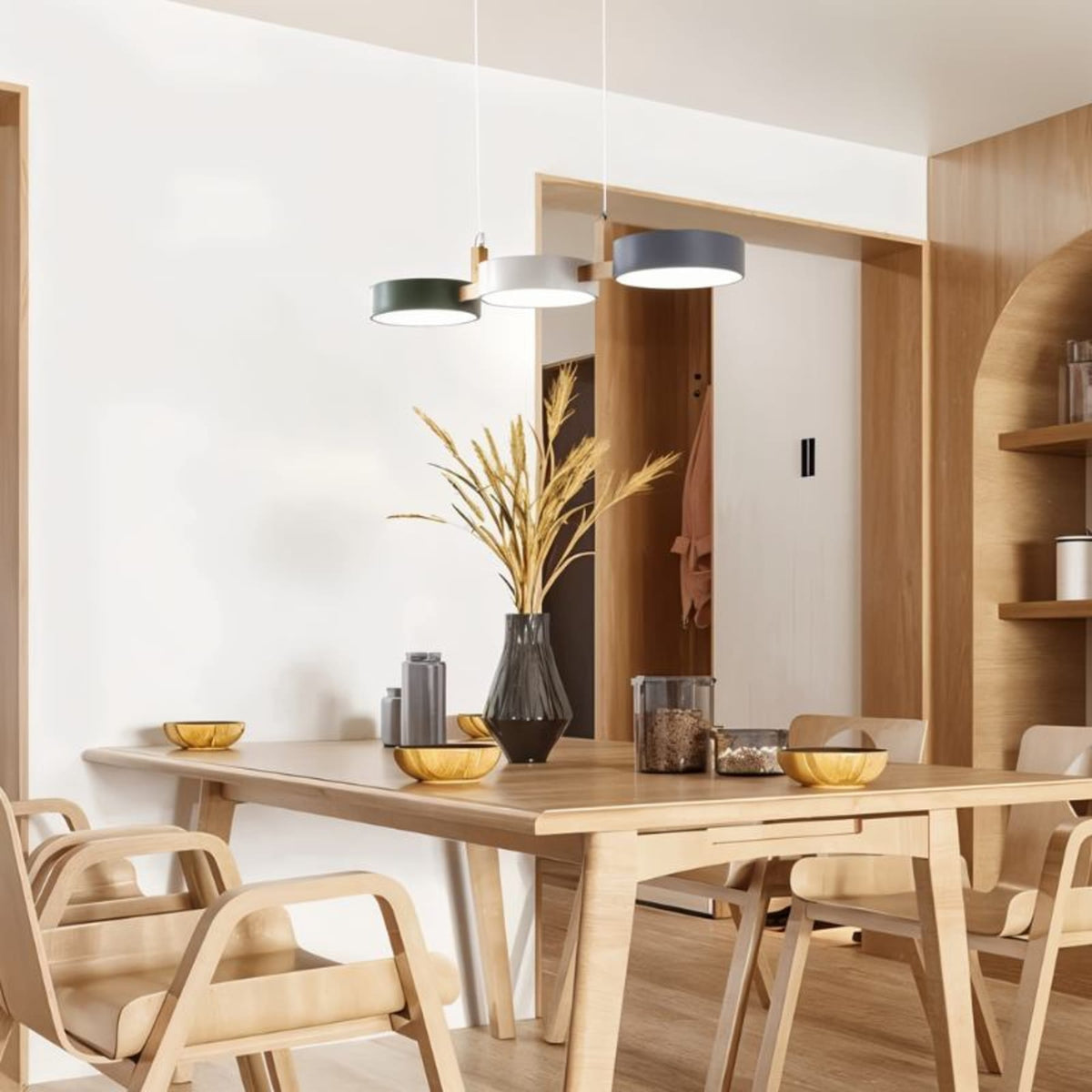 Green white and blue pendant above a dining table