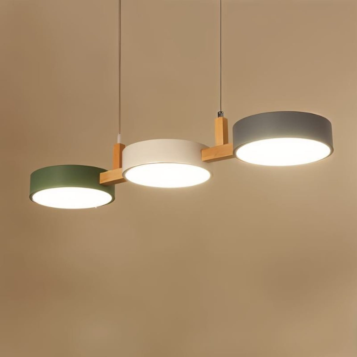 Green white and blue disc pendant with light on