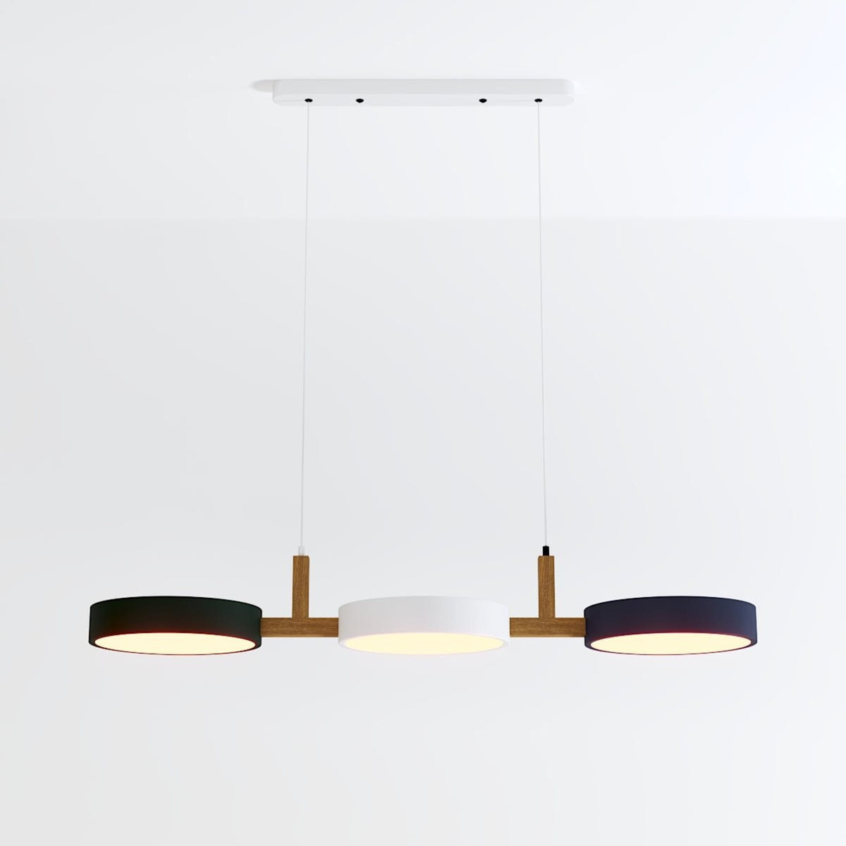 Three-disc pendant with linear canopy