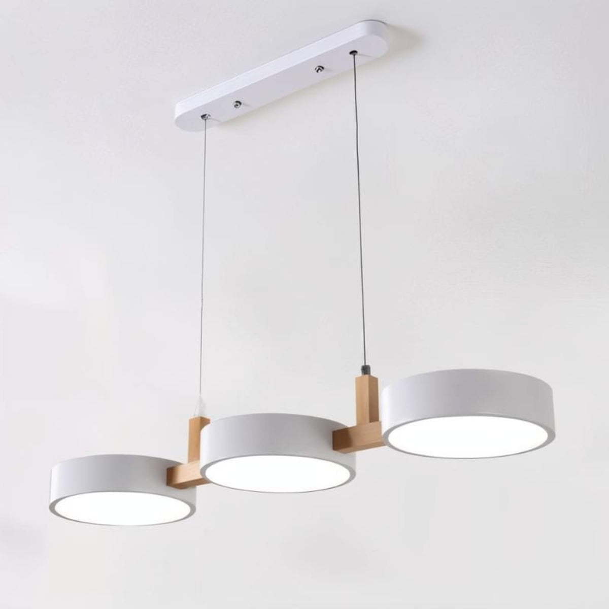White three-disc linear pendant light