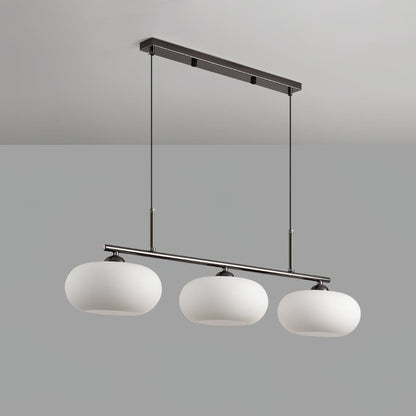 Three-light linear pendant with white glass shades