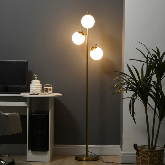 Gold tone three-light tree floor lamp with glass globe shades