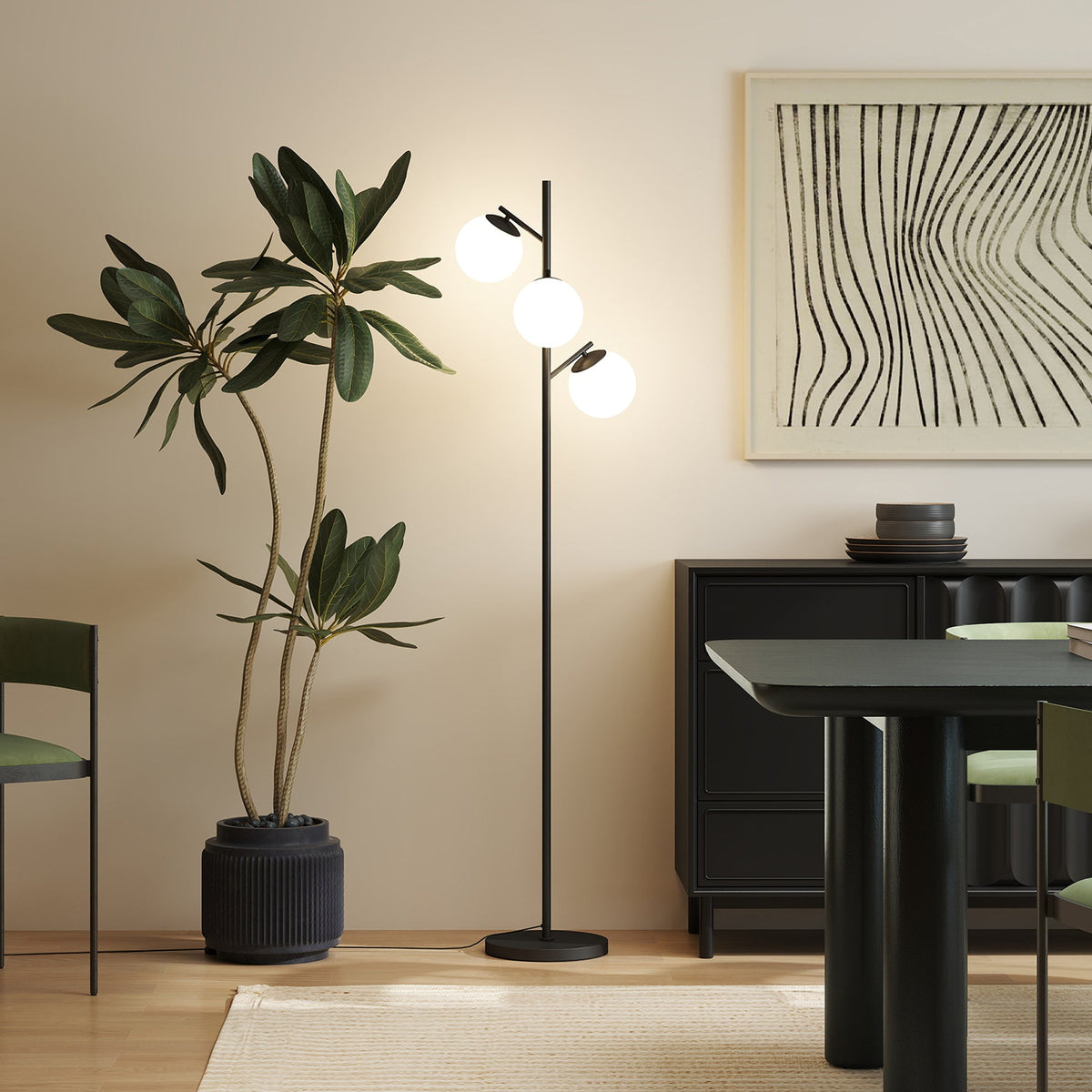 Black three-light tree floor lamp with glass globe shades