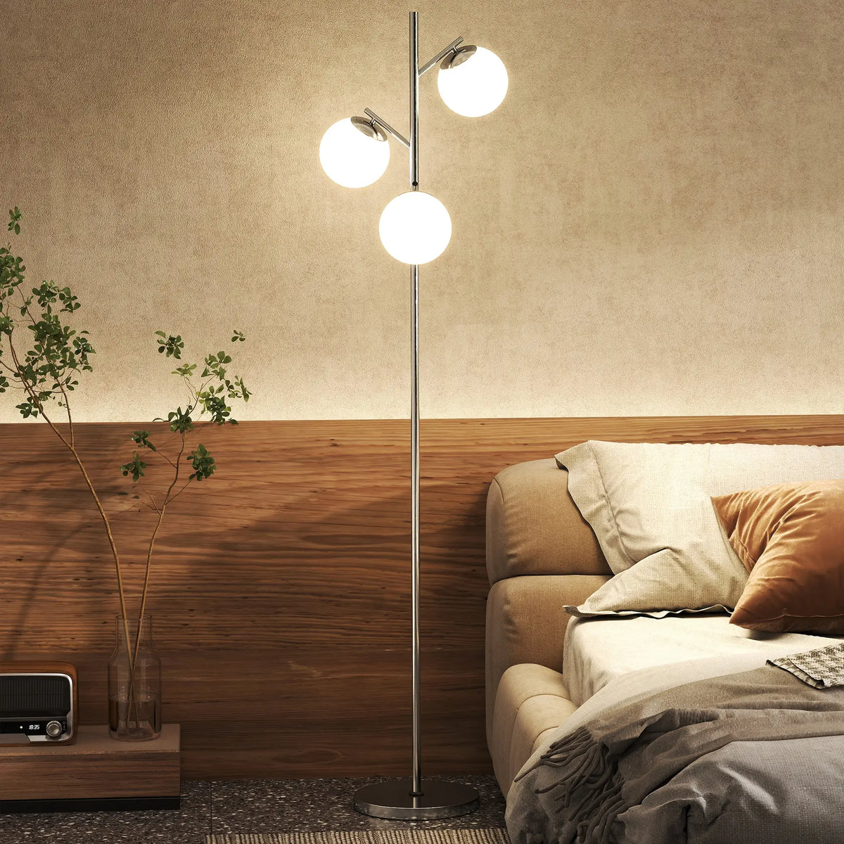 Gold tone three-light tree floor lamp with glass globe shades