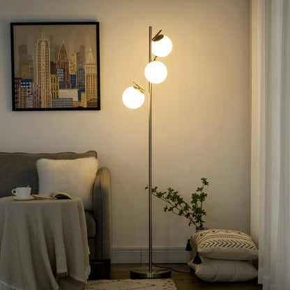 Silver tone three-light tree floor lamp with glass globe shades