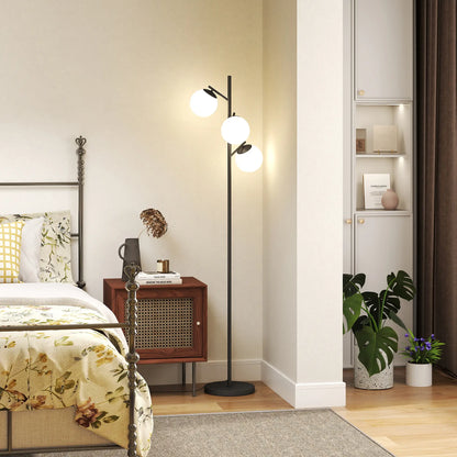Black three-light tree floor lamp with glass globe shades